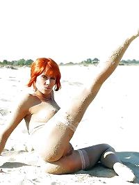 Nude sexy MILF in nylon stockings on the beach